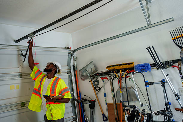 Professional Garage Door Spring Repair technician working in Connellsville, PA
